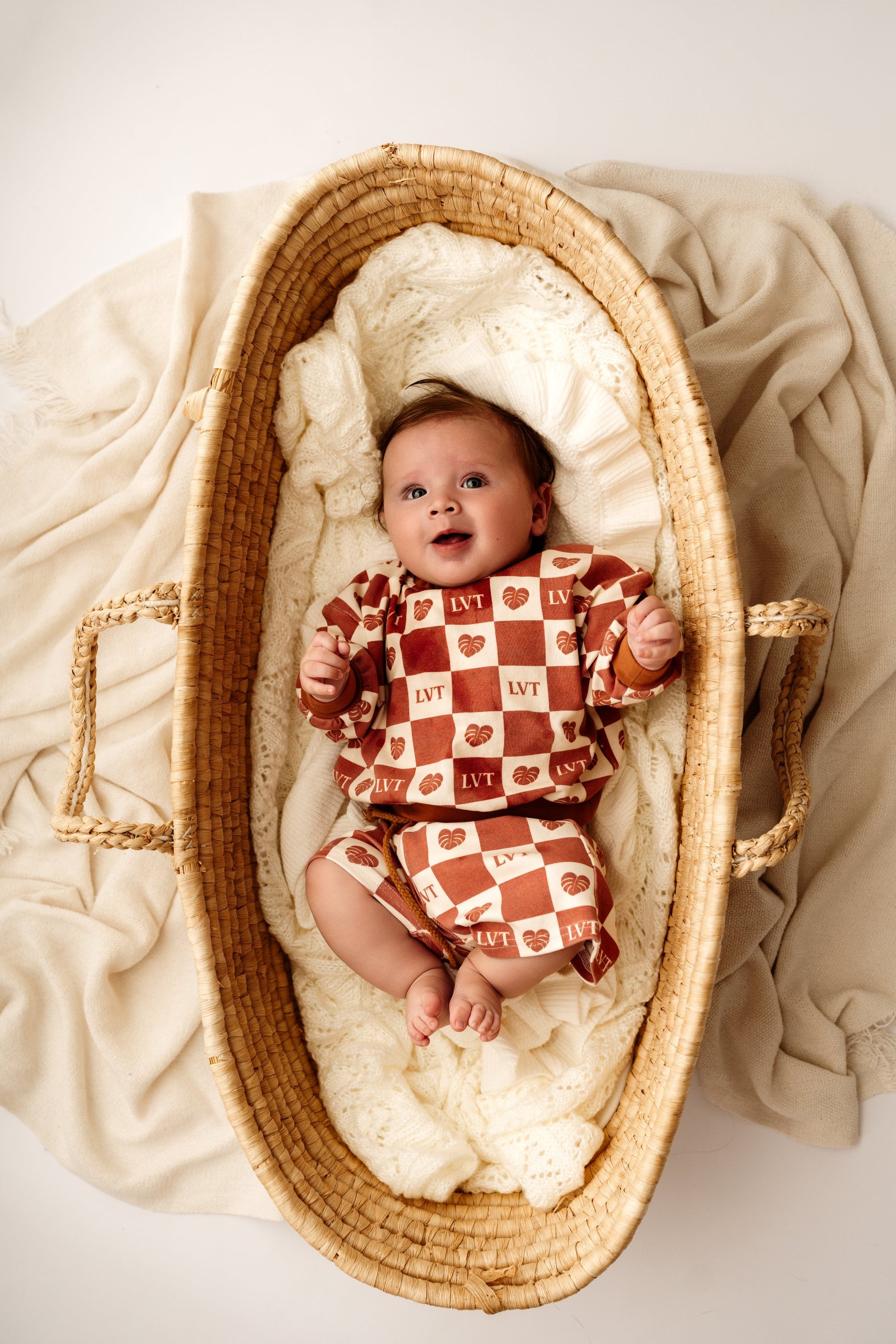 Baby wearing the Atelier brown check two piece set from Little Violet Threads