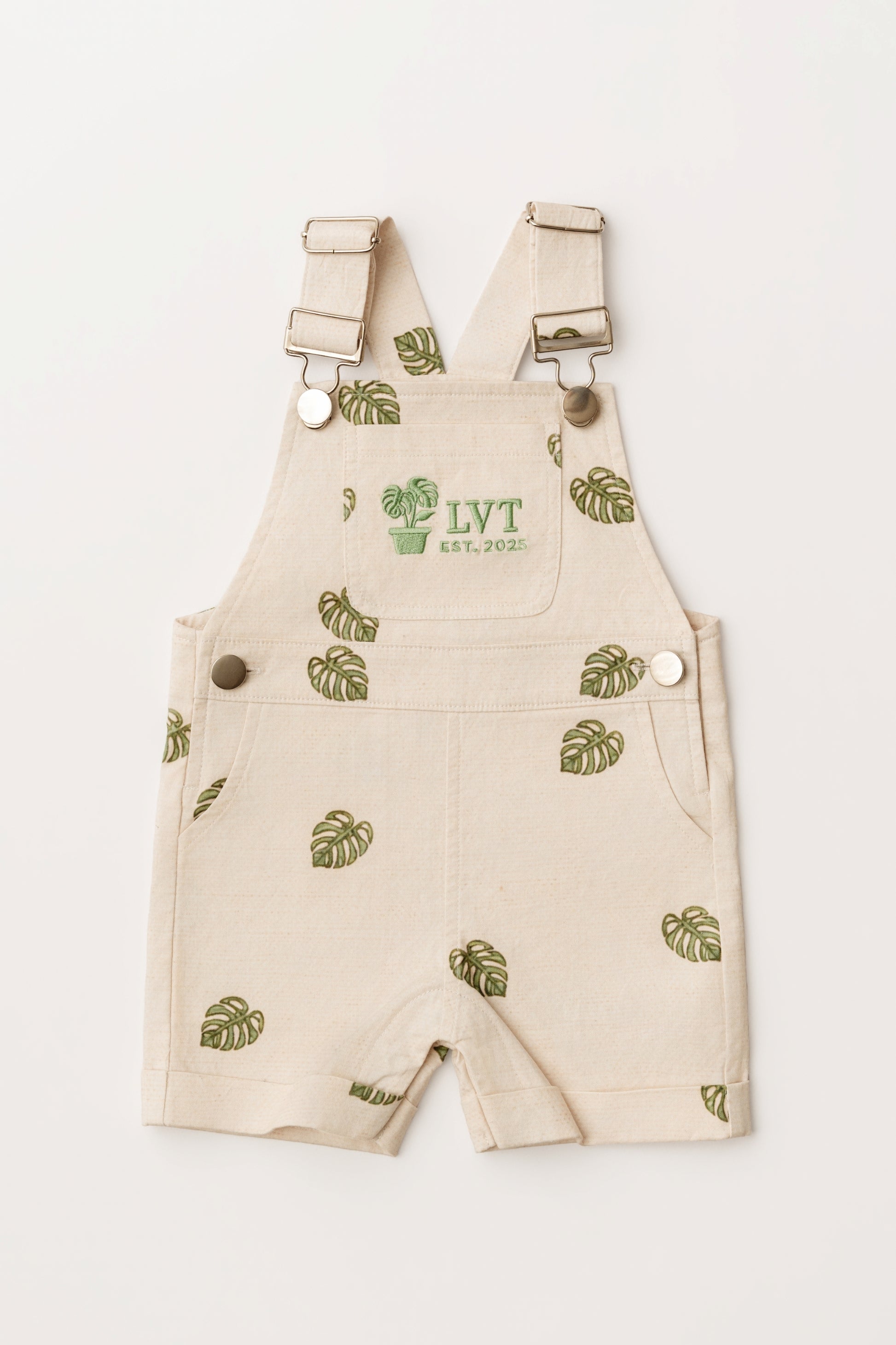 Beige Monstera Baby Overalls cotton leaf infant overalls flat lay on white background